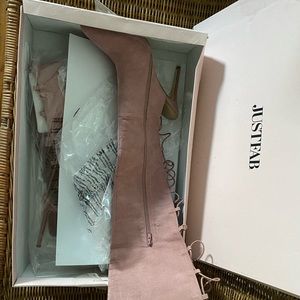 Thigh high heeled boots